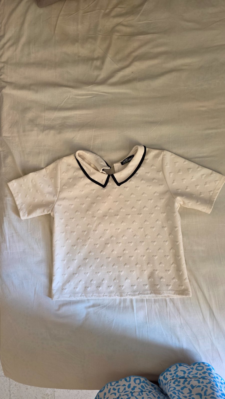 Un pull blanc 