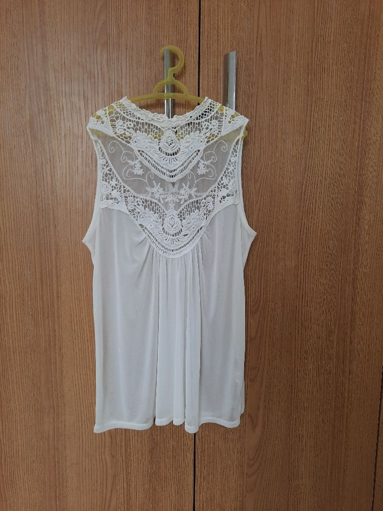 Chemise blanche sans manches 