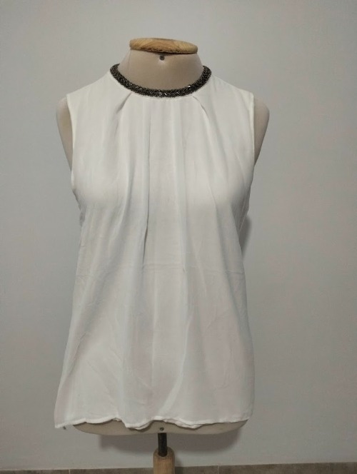  Top sans manches blanc à col bijou