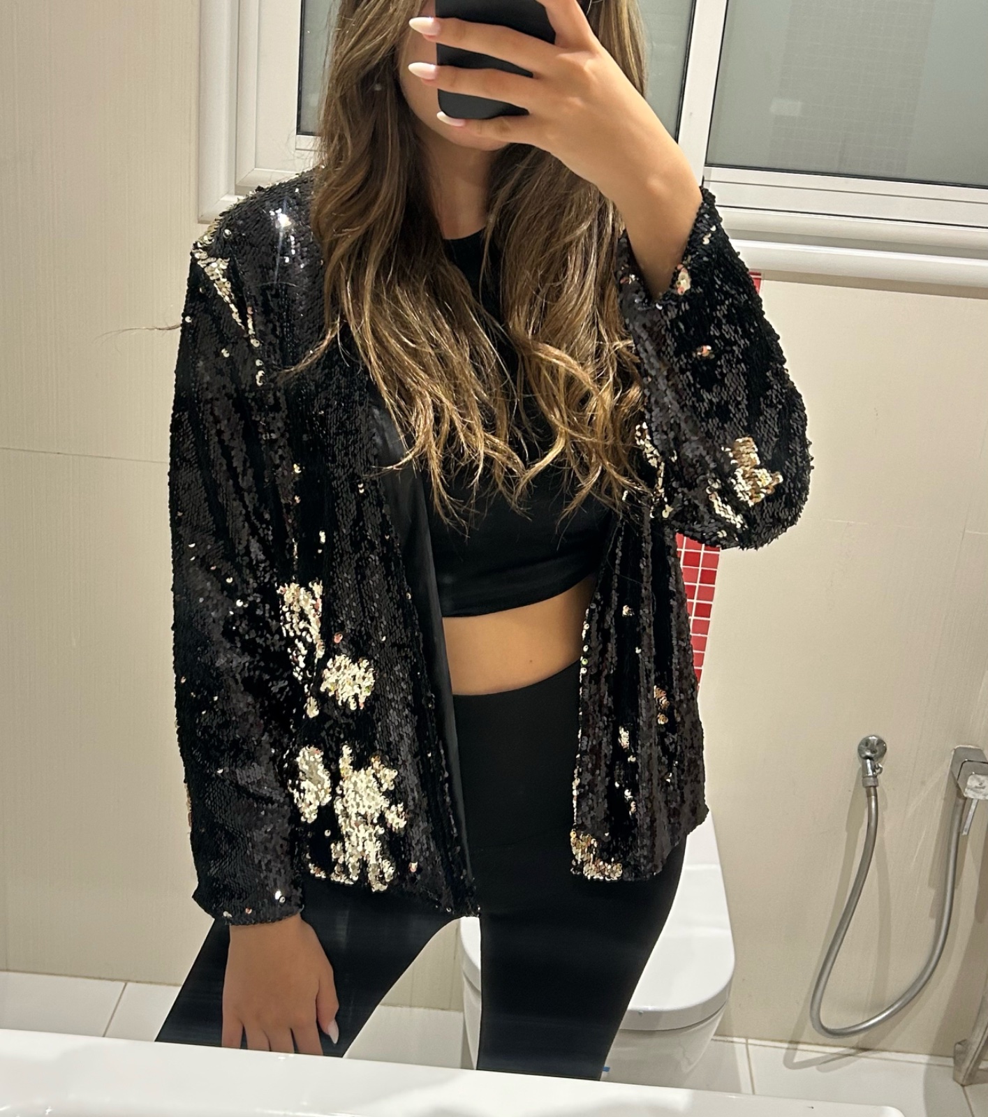 Veste noire à sequins réversibles 