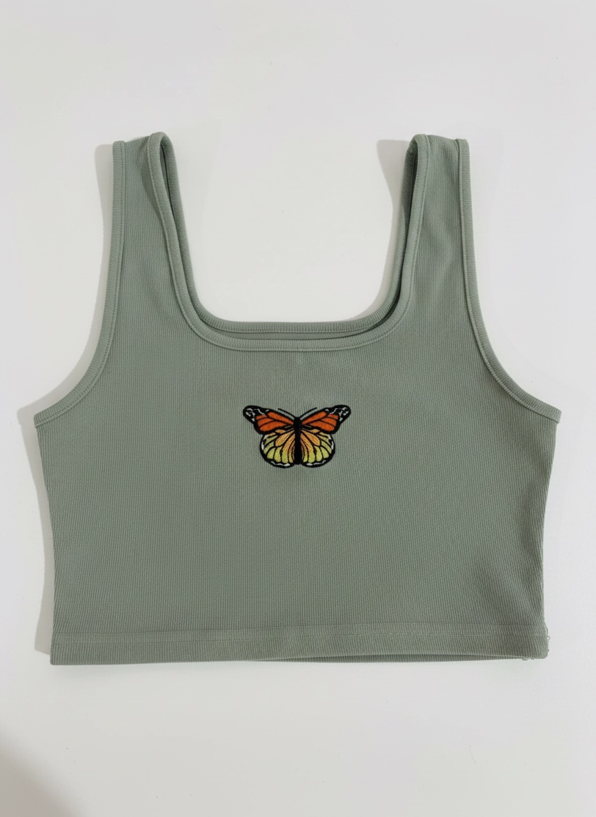 Top avec motif papillon