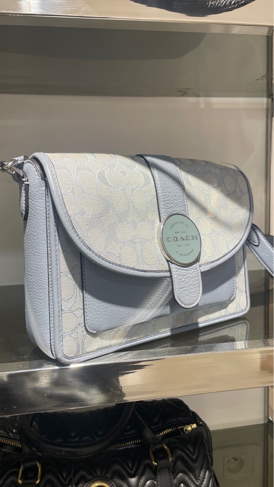Sac bandoulière coach en très bon état en cuir et en toile