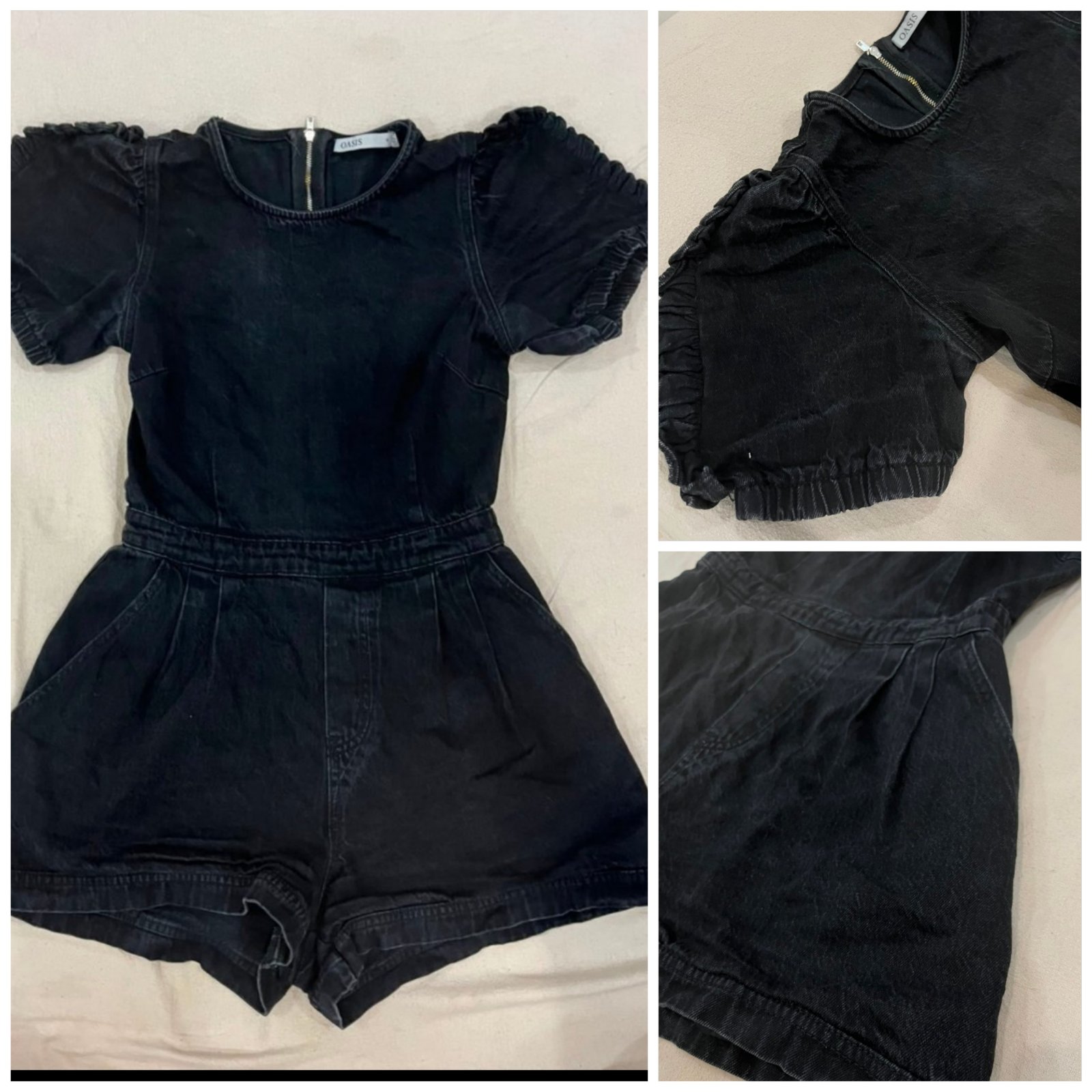 Combinaison courte Oasis en denim noir se distingue par ses manches bouffantes froncées