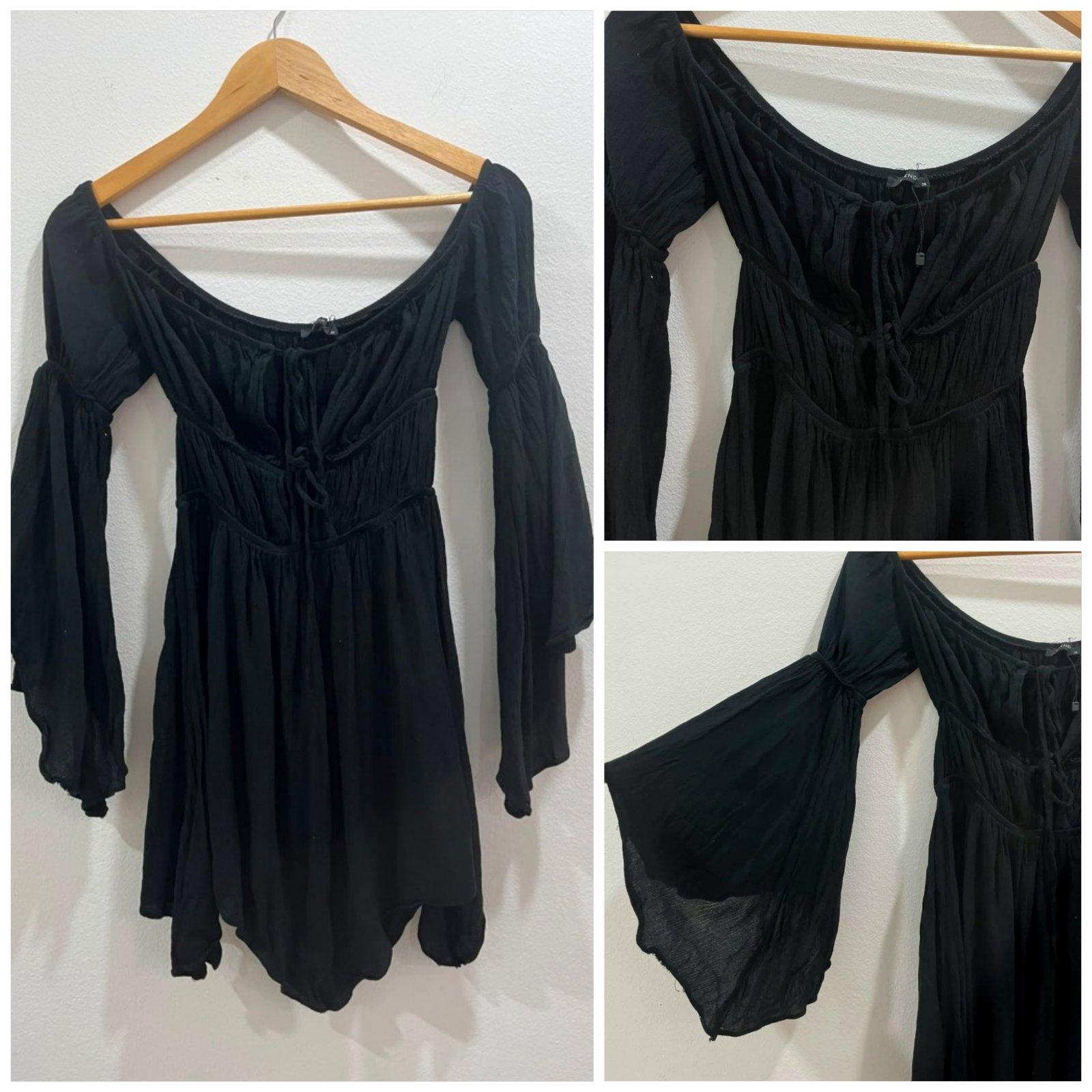 Robe noire présente un style médiéval avec des épaules dénudées et des manches évasées