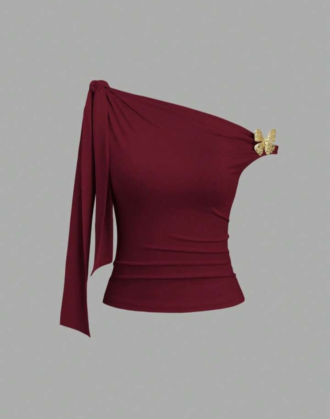 Blouse asymétrique bordeaux de chez SHEIN se distingue par son élégant nœud sur l'épaule et une délicate broche papillon dorée