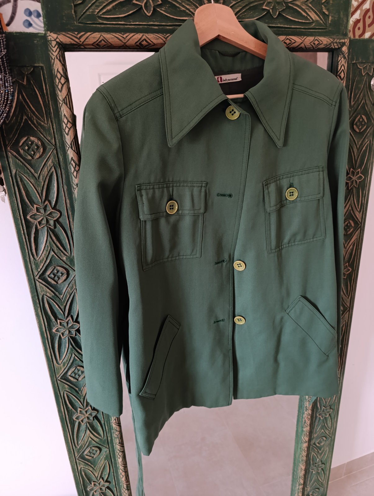 Très jolie veste verte