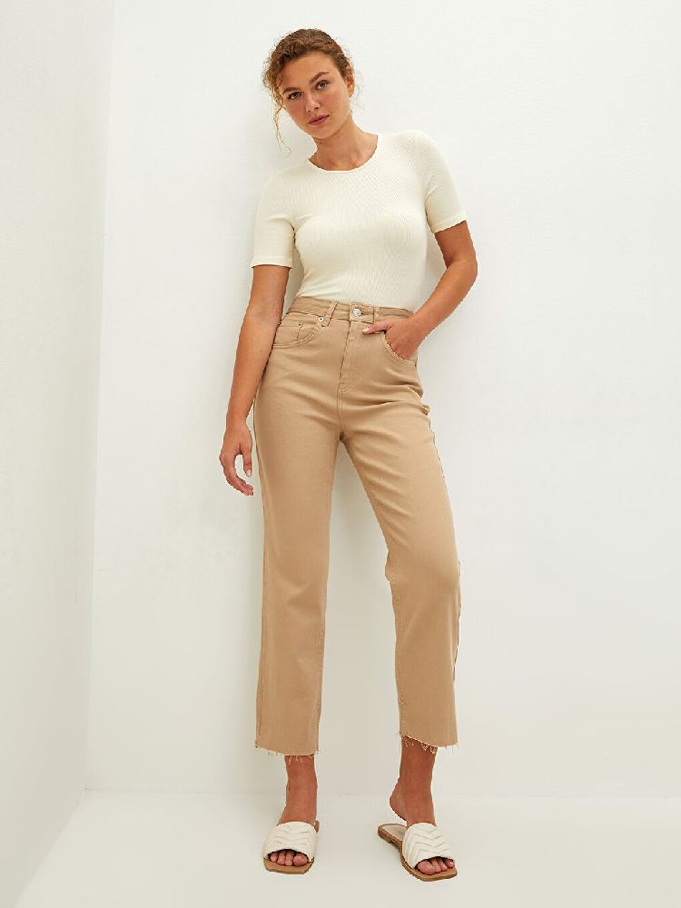 pantalon  en jean beige de LCW taille XS, (yji pour fillette), jamais porté