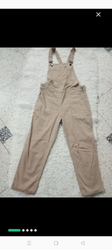 salopette de Zen en jean léger beige, portée une seule fois, taille mentionnée L mais tlabass M khir