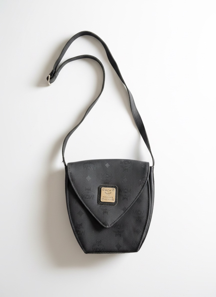 Sublime sac a bondouliere MCM comme neuf 