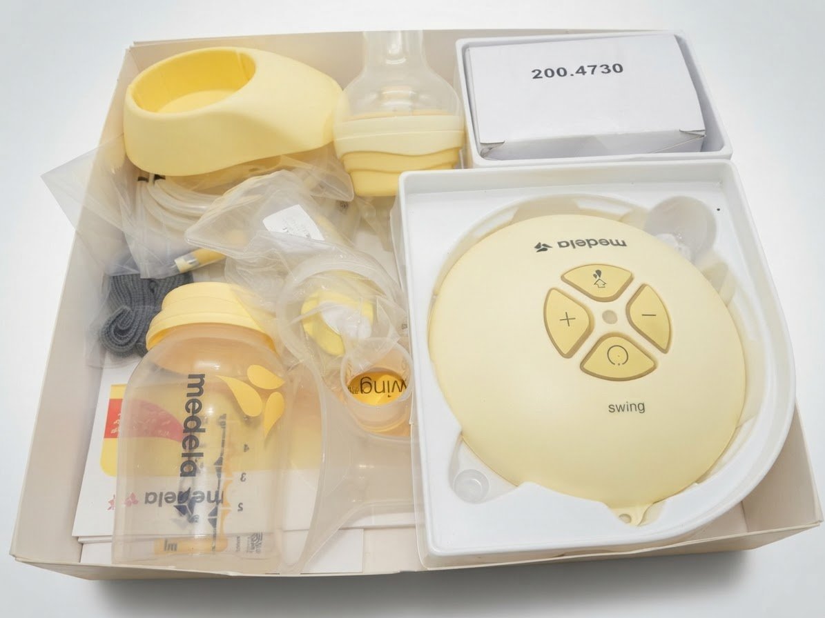 Tire lait électrique medela swing 