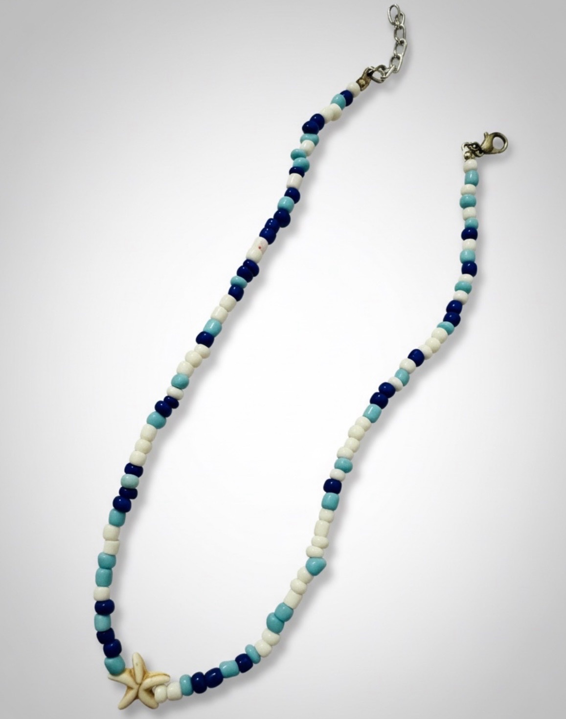 Collier etoile plage 