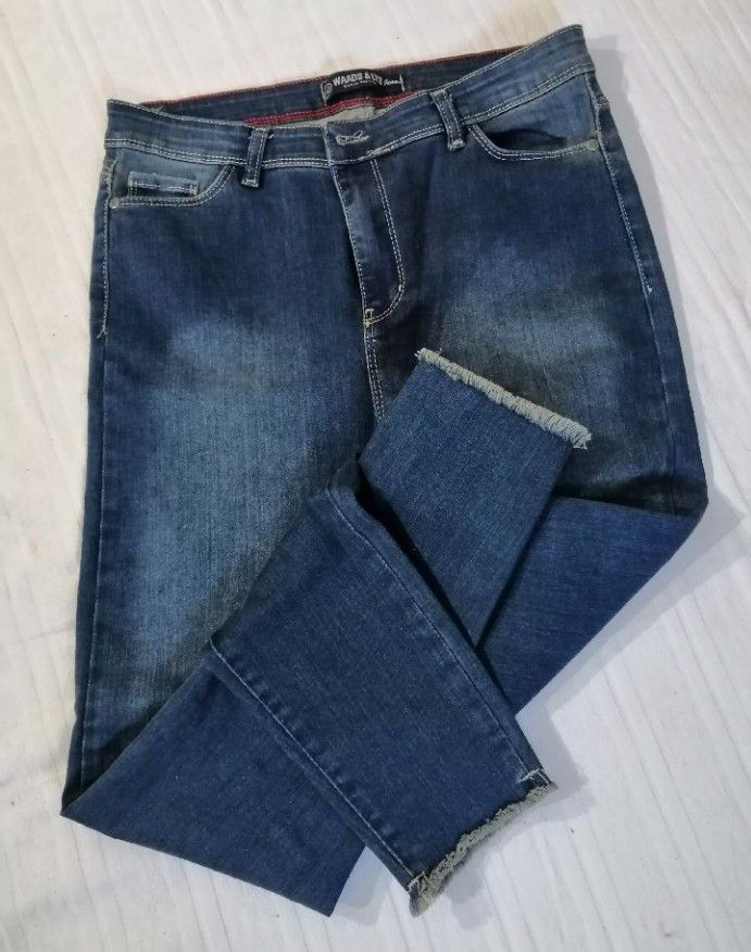 Jean taille haute, tres peu porté