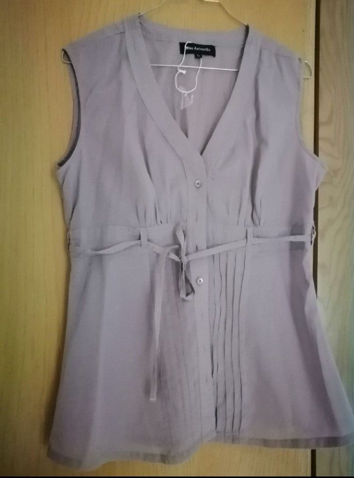 chemise sans manches parme, neuve 