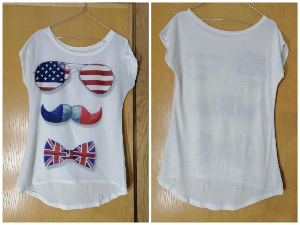 Pull blanc motif visage 