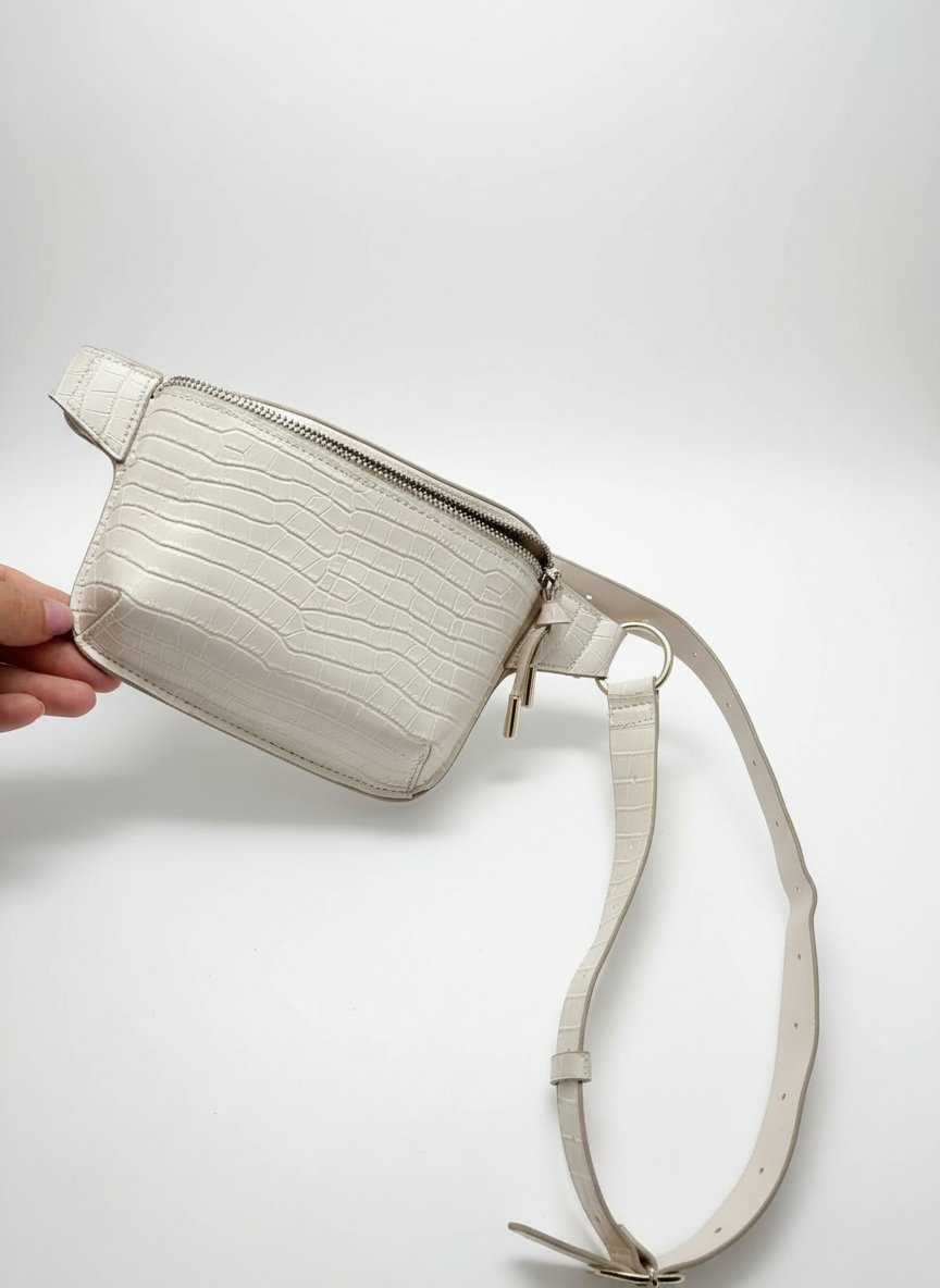 Sac banane H.M couleur beige en très bon état 