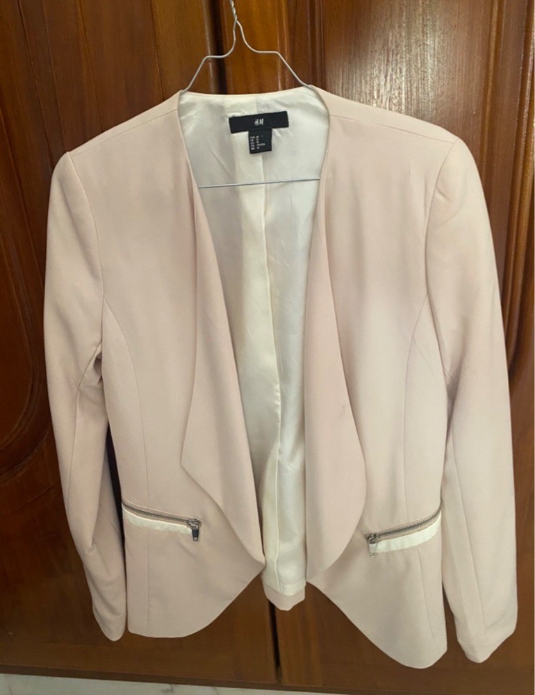 Veste rose poudré