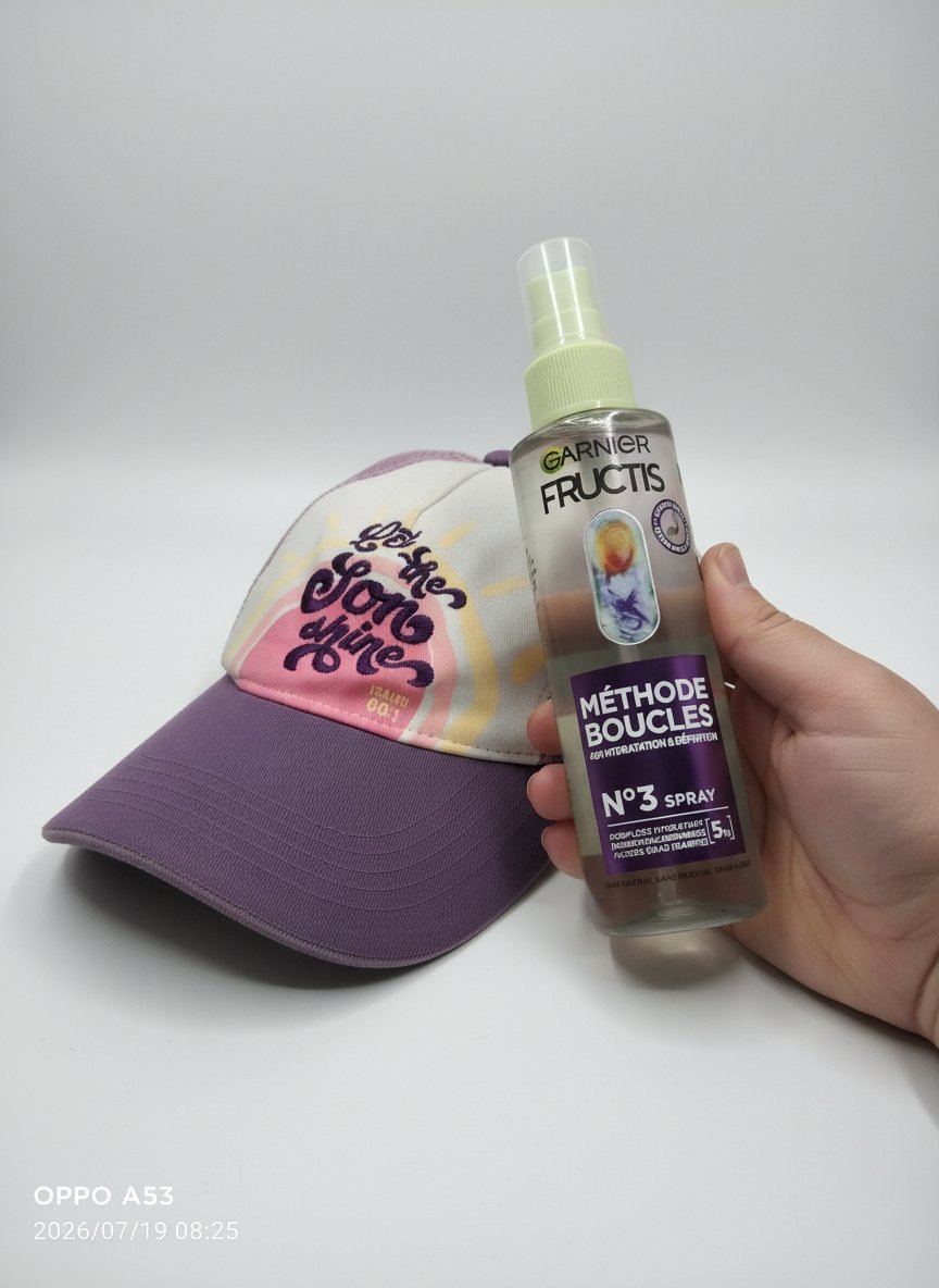 Lot  casquette et  sérum de bouclage Garnier 