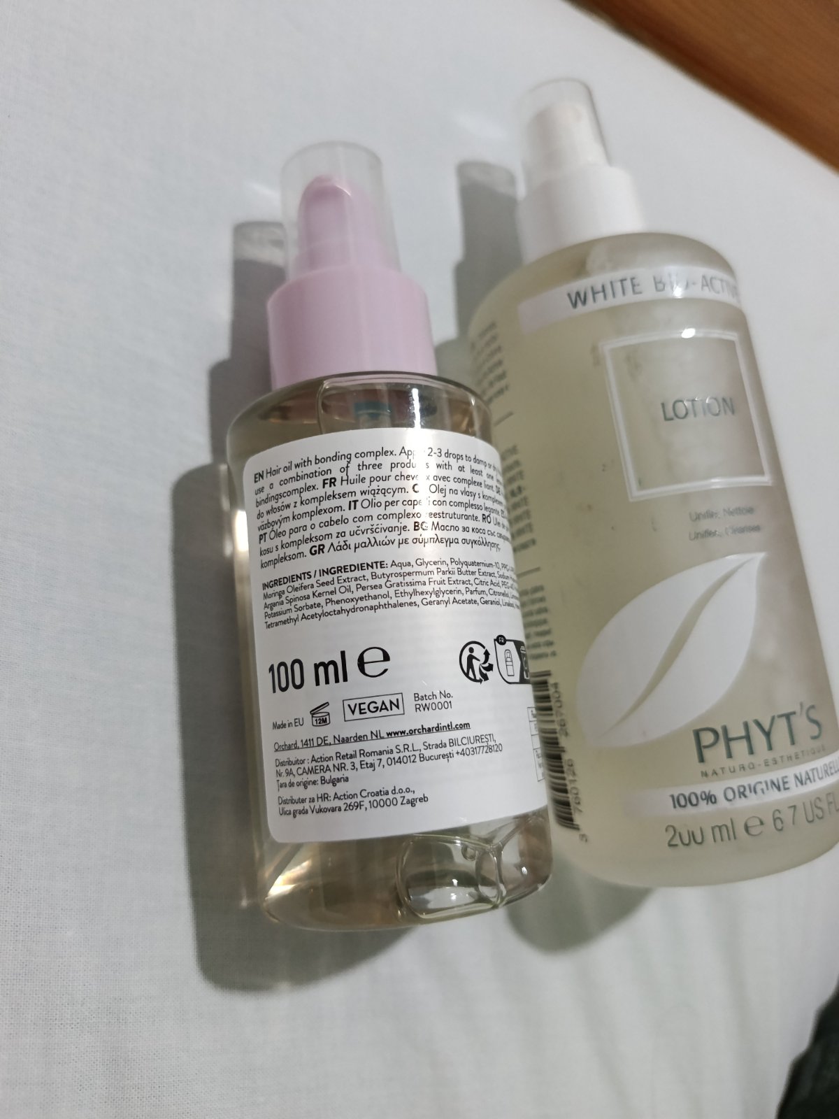 Bouteille de Huile Capillaire 100ml Réparatrice et lotion nettoyante et tonique 200ml .