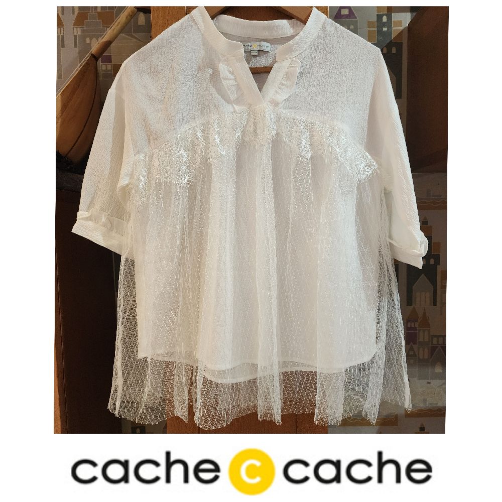 Chemise très chic en dentelle blanc toute neuf 
