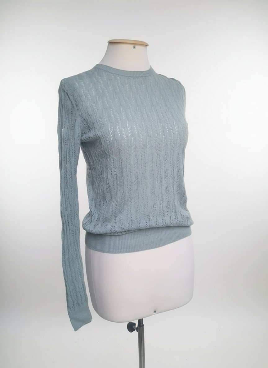 Pull ajouré en vert d'eau très bon état 36/38