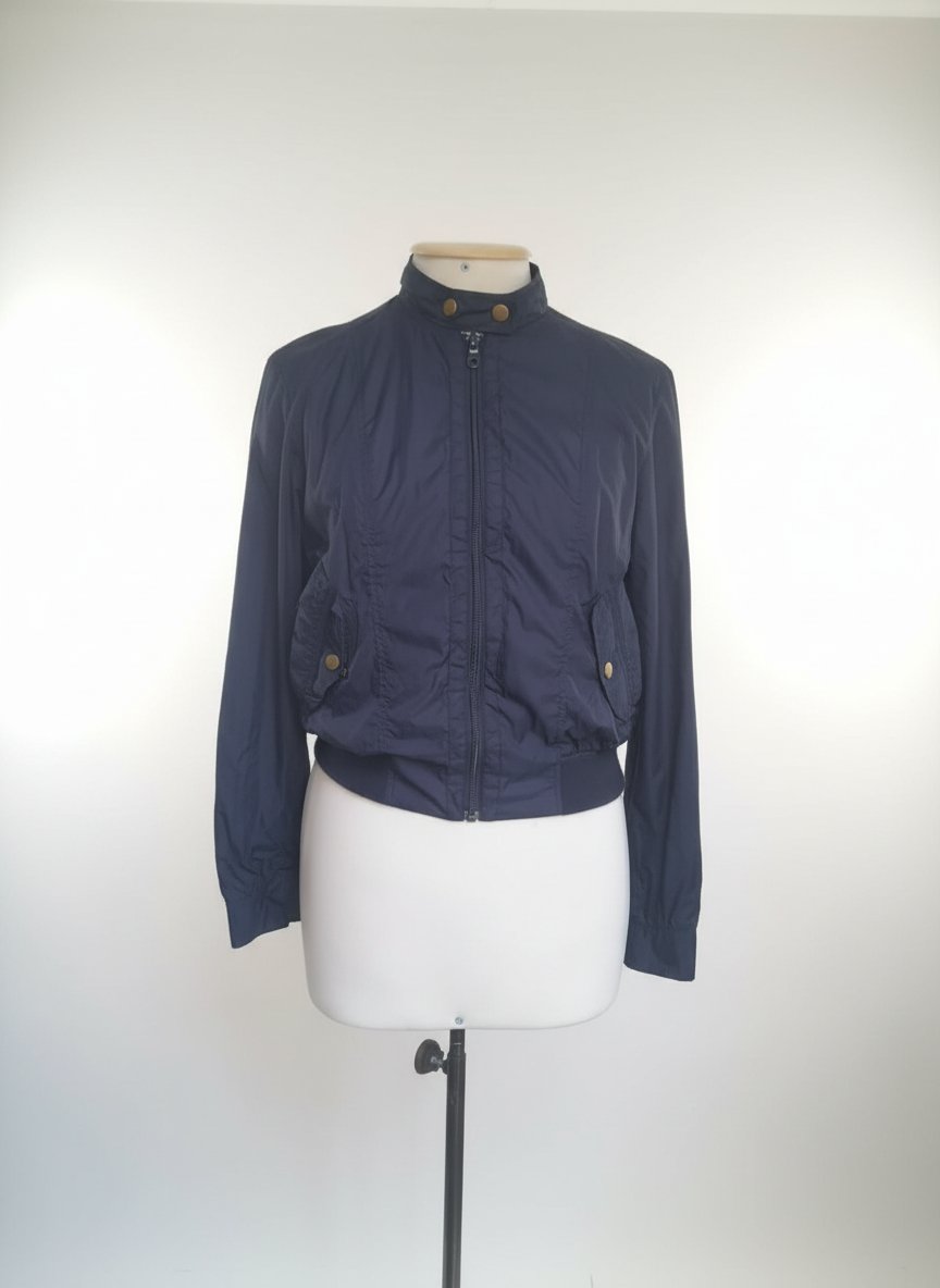 Veste légère coupe vent de la marque Jacob très bon état 