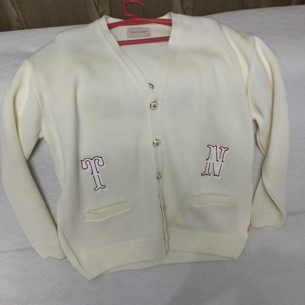 Veste en blanc avec détails 