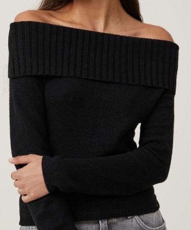 Pull en noir col bateau tendance