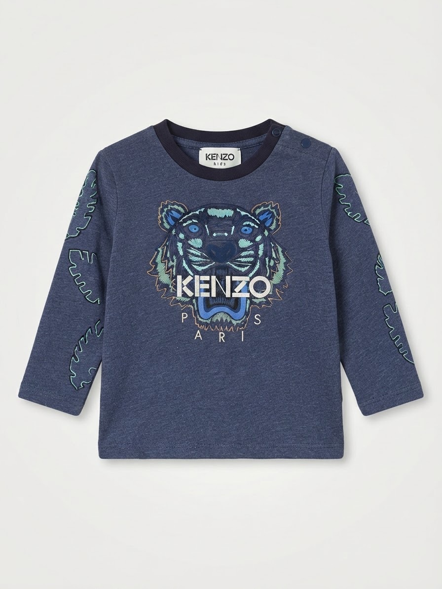 Un body kenzo 6mois + pantalon ( nrmlmnt kiabi )