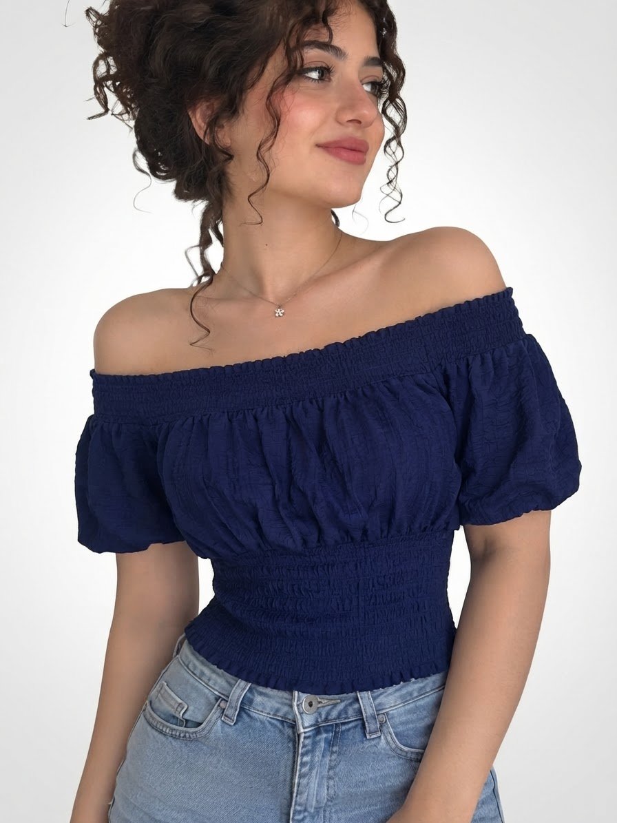 Top femme bleu marine à manches bouffantes