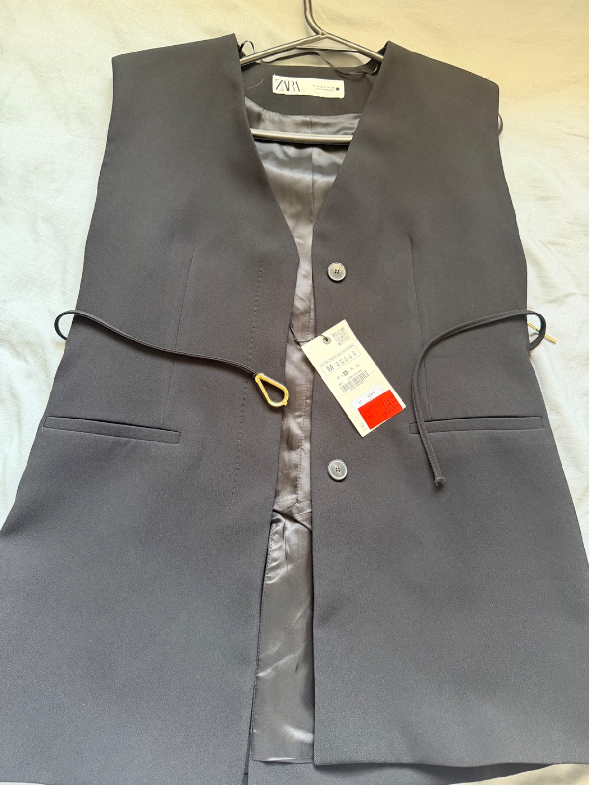 Veste sans manche trois quart