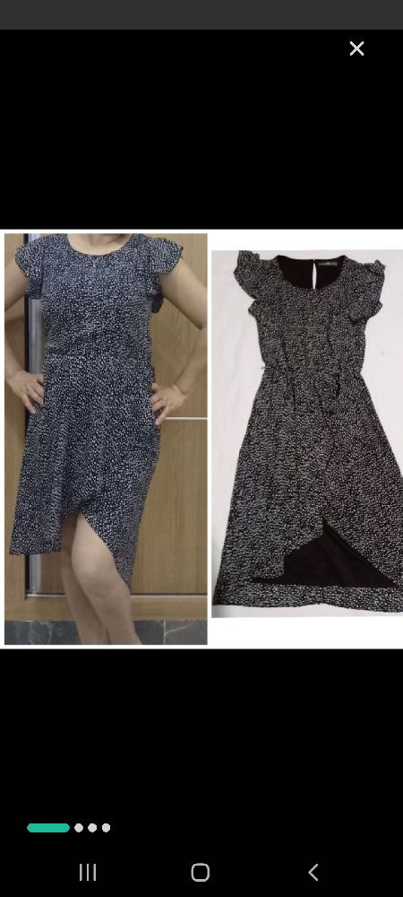 jolie robe noir croisé à petits pois blancs et petits volants aux épaules très tendance 