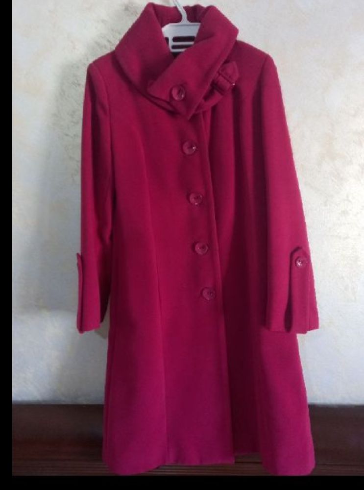 Manteau rose fuschia très classe avec un prix cadeau tt neuf