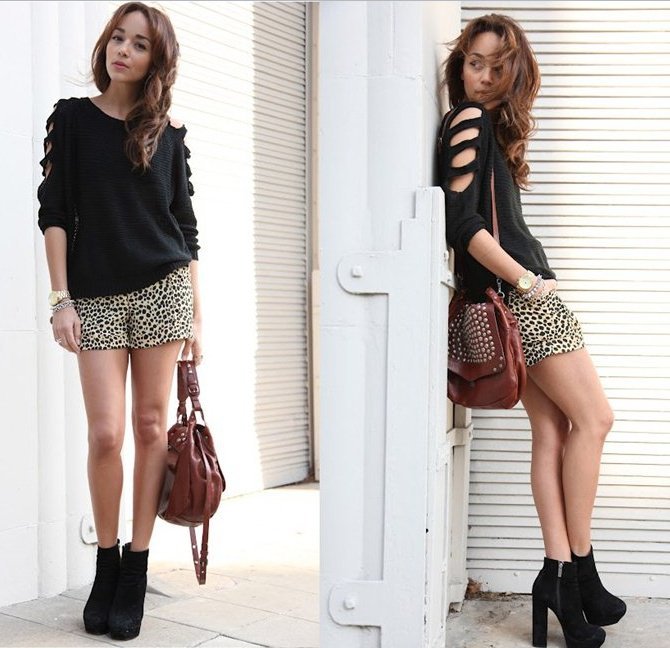 Black sweater with accent cut-outs on sleeves