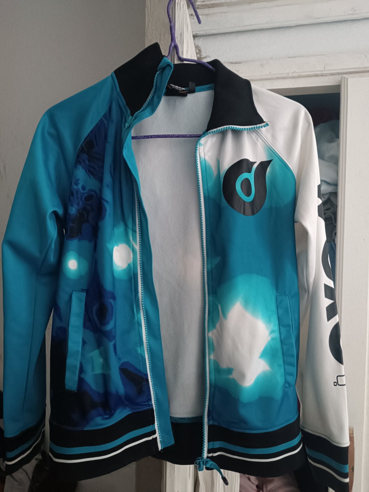 Veste de sport stylée - Bleu turquoise et Blanc