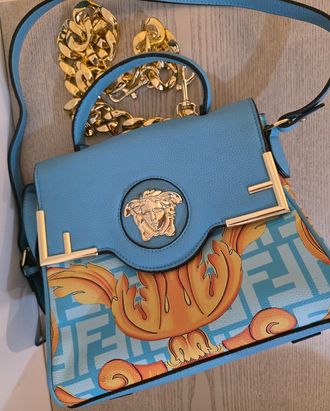 Sac a deux bandoulieres chaine et cuir 