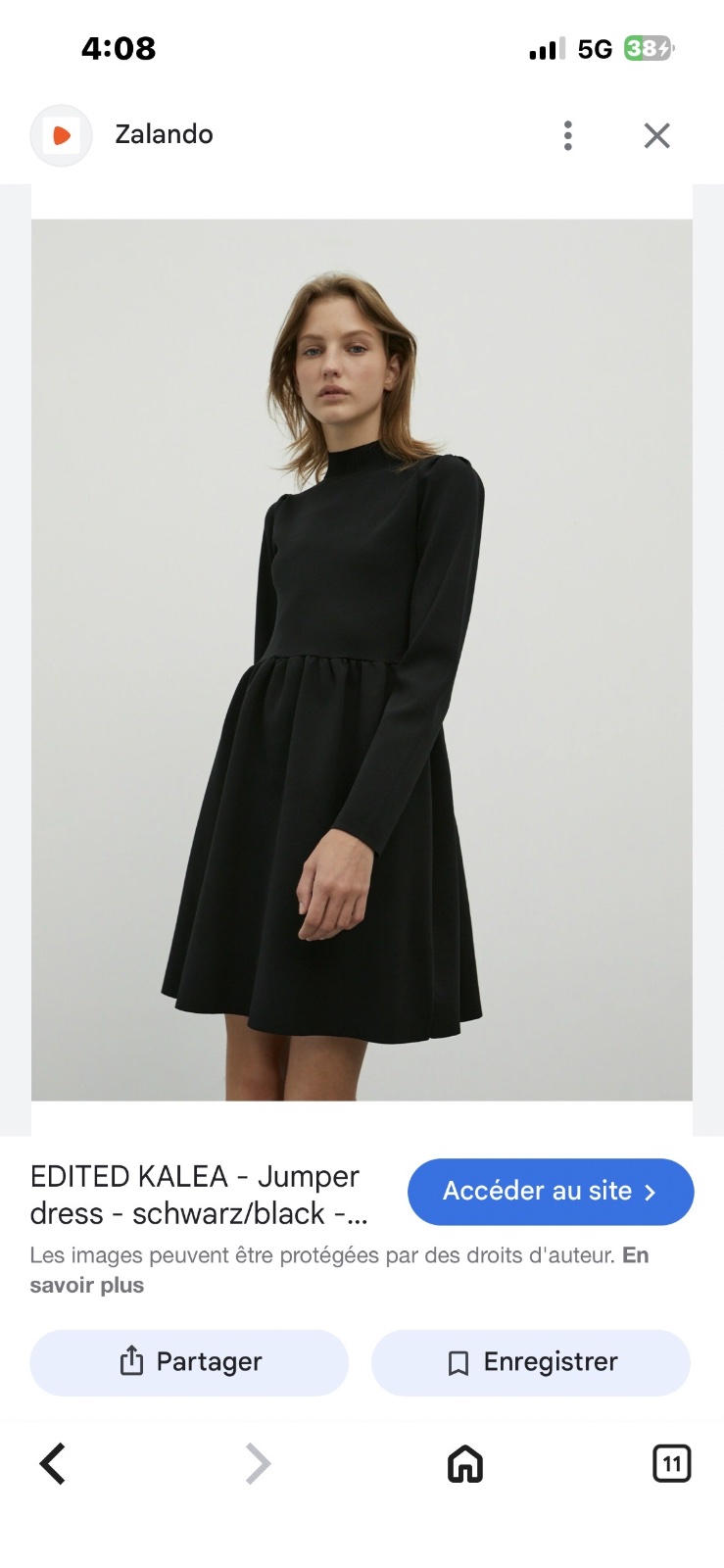 Robe noire Zara modèle viral en maille avec col montant et manches longues bouffantes 