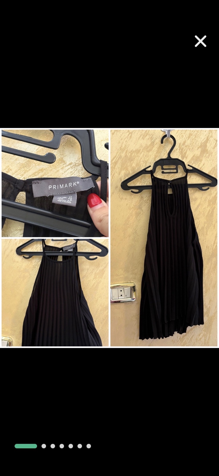 Haut Primark noir arbore un design plissé élégant avec une encolure haute