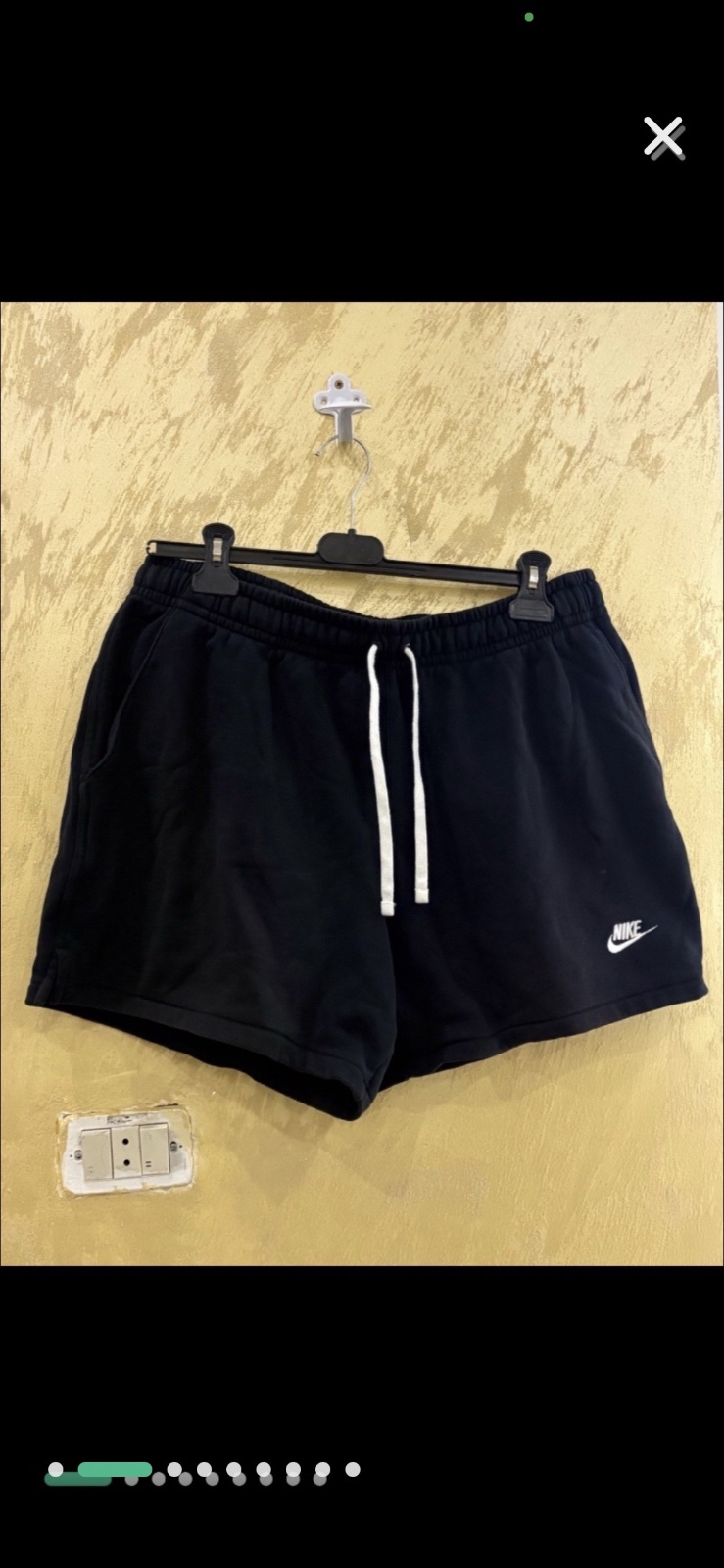Shorts Nike Club Fleece French Terry Flow noirs avec un logo blanc