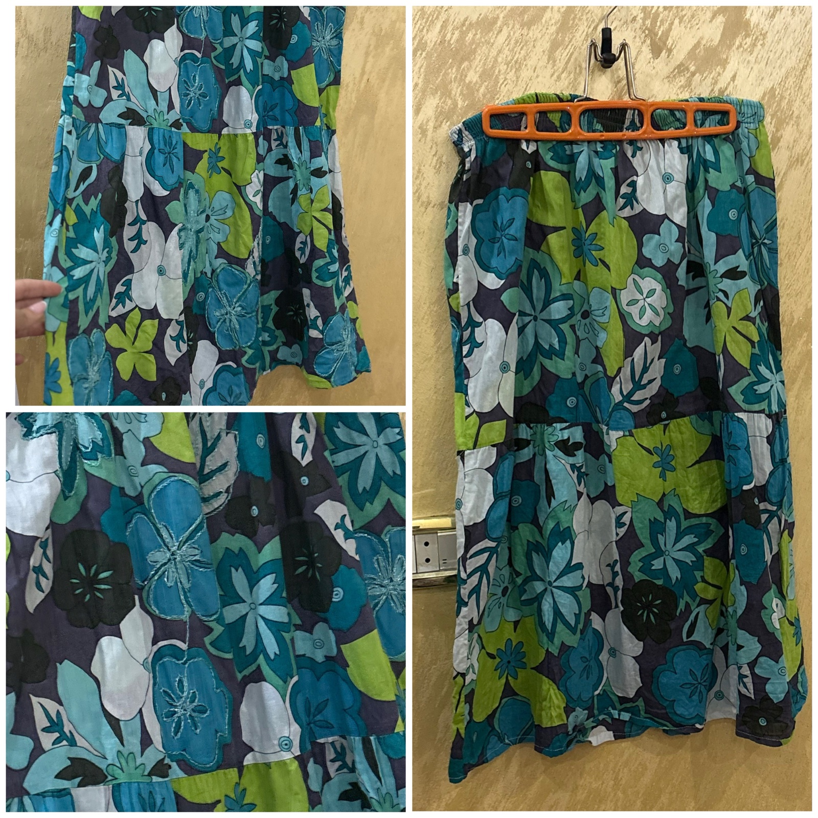 Jupe maxi fleurie  pièce estivale évasée avec un motif floral aux tons bleus et verts