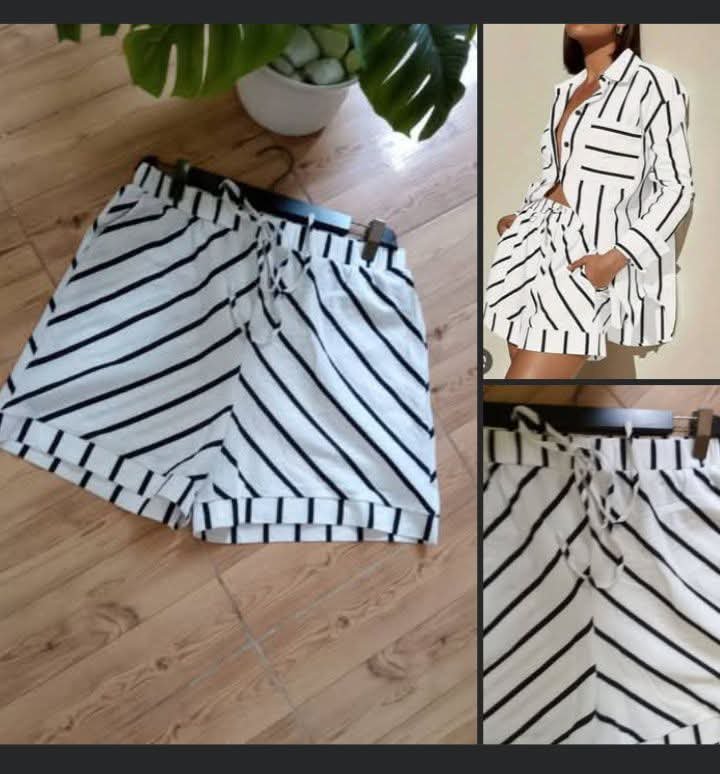 Très joli Short a rayures taille 42/44