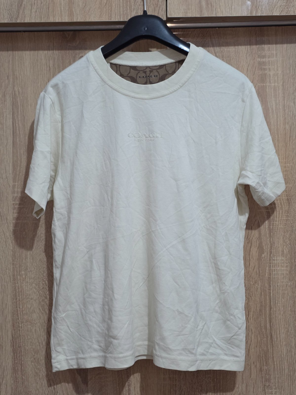 T-shirt coach