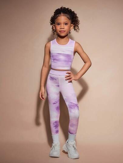 Haut de sport (5.6ans)+leggings de sport (7,8 ans)