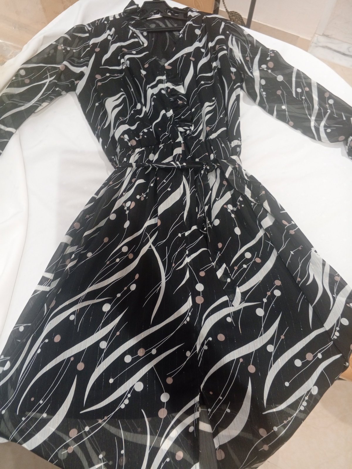 A vendre robe longue avec doublure moins courteavec une fente au milieu 