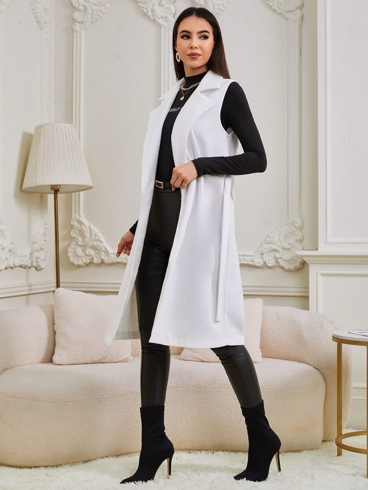 Manteau sans manches ceinturé blanc  sans ticket de taille mais il convient à la taille M 
