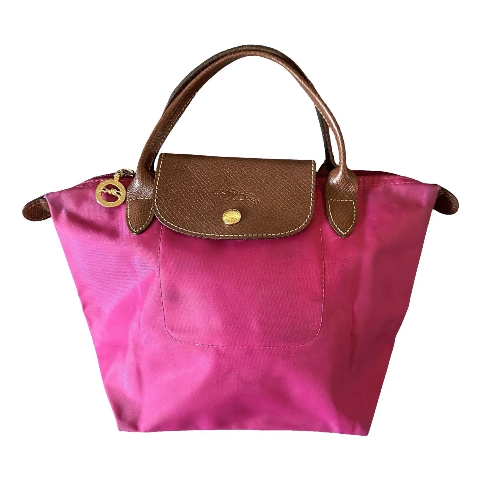 👜 Longchamp à vendre  Très joli modèle, encore en bon état général.