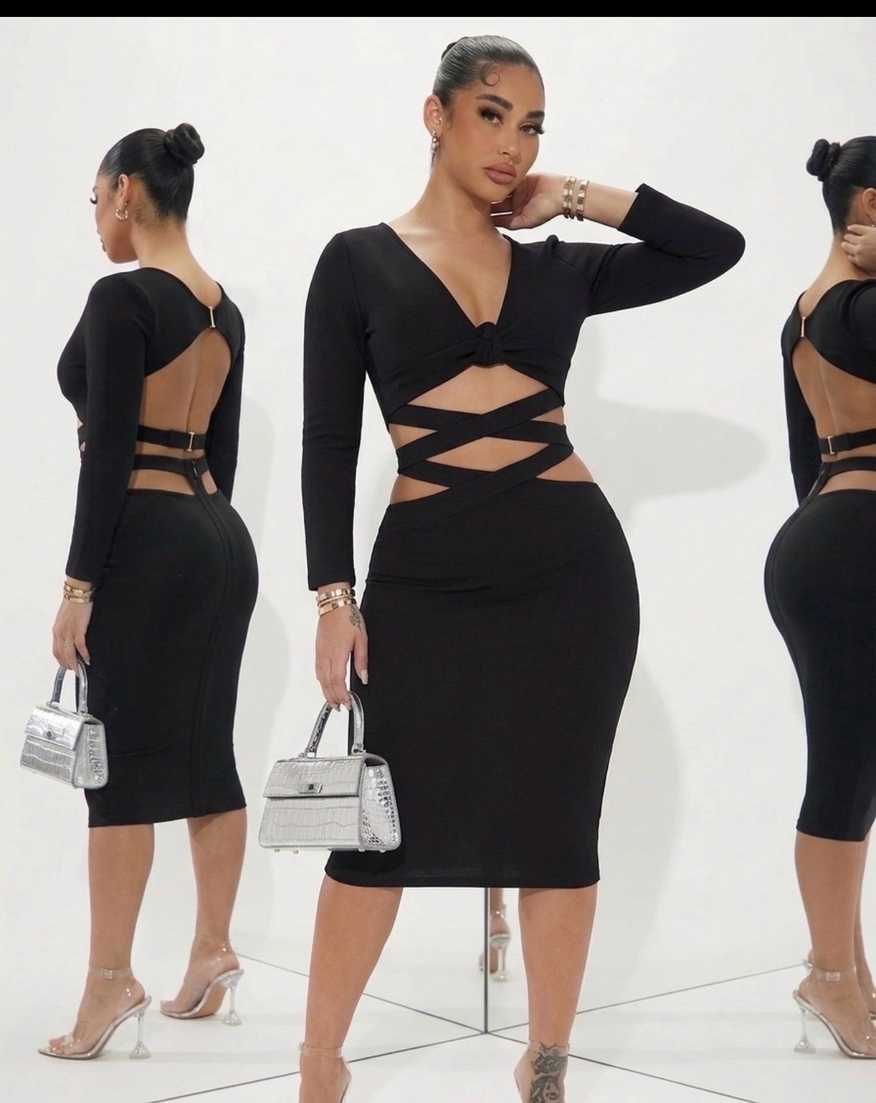 Élégante robe noire à découpes croisées, pour un style audacieux et chic. 🔥👗✨