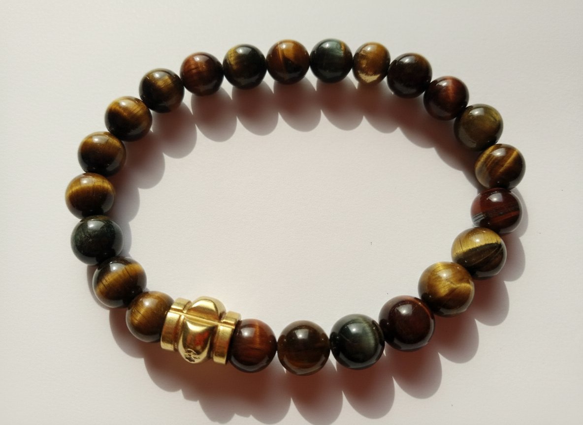 Magnifique bracelet en pierre d'oeil de tigre et fe taureau 