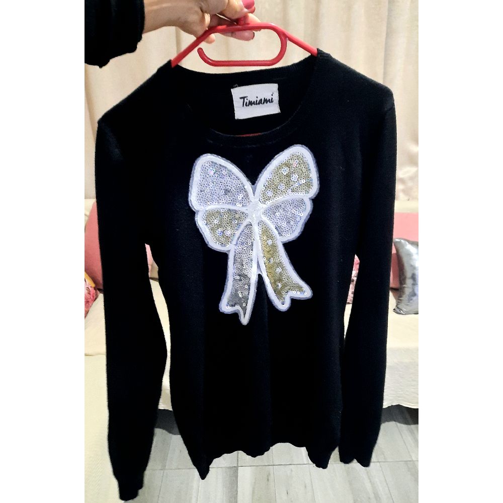 Pull importé  de taille S / M