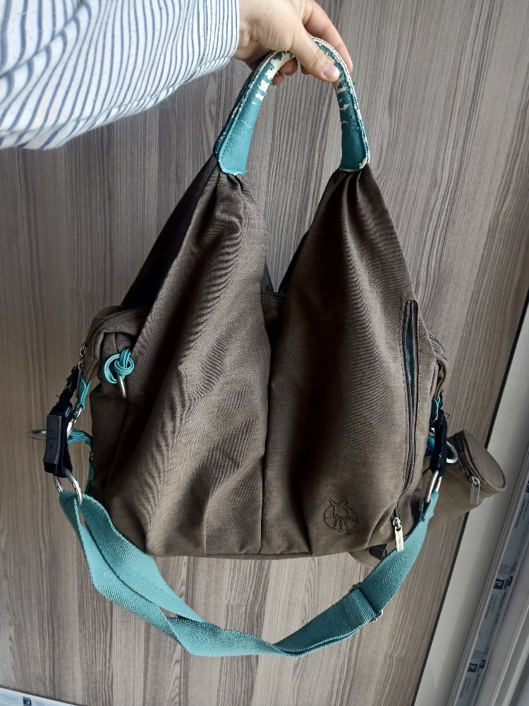 Sac bébé kbir barsha w tapis d'échange 