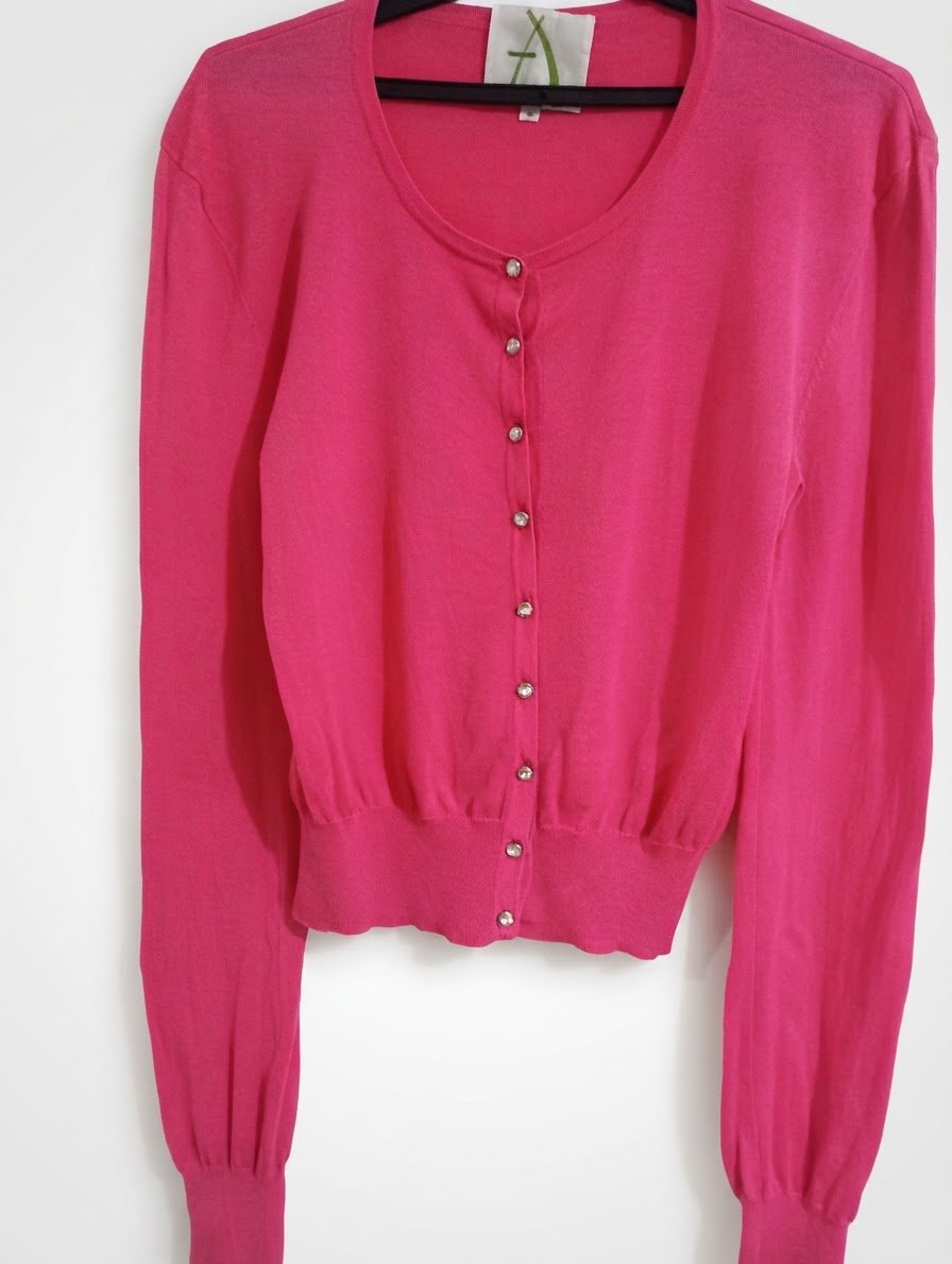 Deux gilets :rose et blanc 
